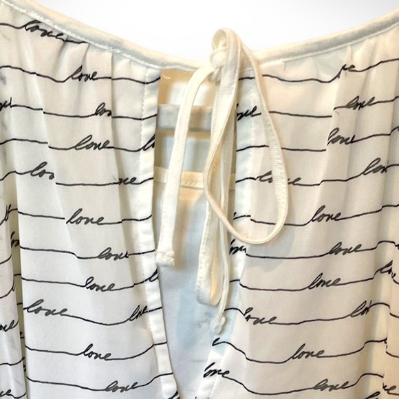 EXPRESS | High Neck Black + Ivory “LOVE” Cursive Print Tank Blouse - Picture 7 of 7